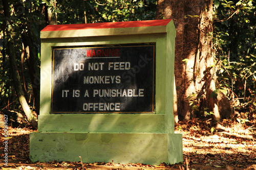 Warning do not feed the monkeys sign