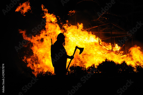 Viking and burning building