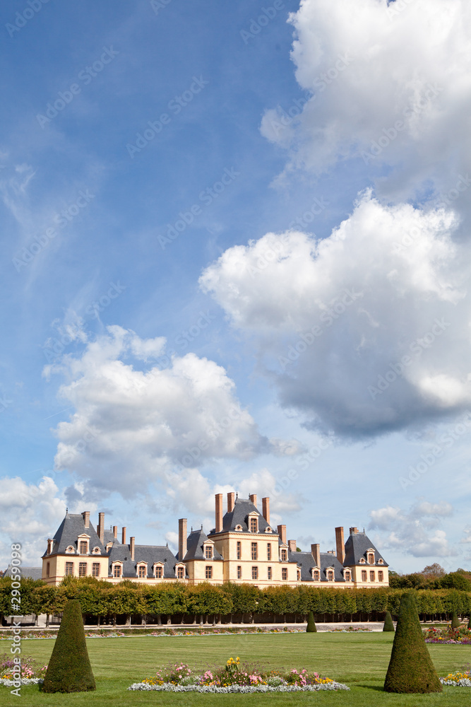 Medieval royal castle Fontainbleau near Paris in France and gard