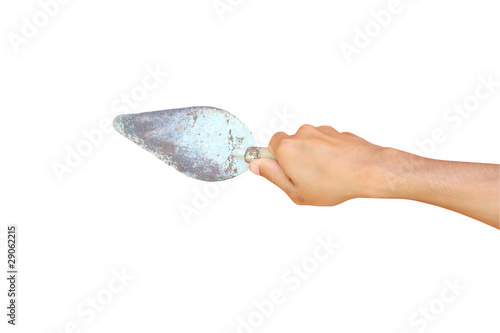 palette-knife in hand isolated on a white background . © rufous
