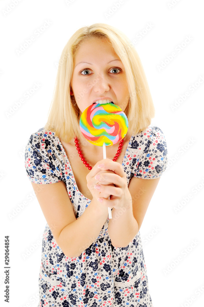Attractive blonde eating lollipop