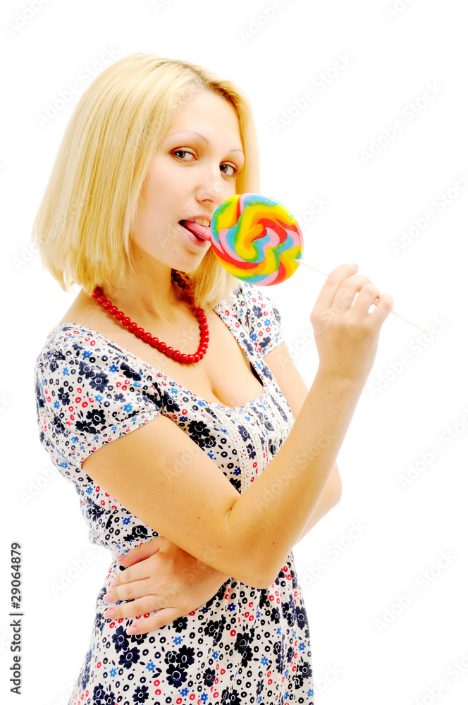 Attractive blonde licking lollipop
