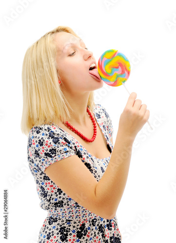 Attractive blonde licking lollipop © Sergey