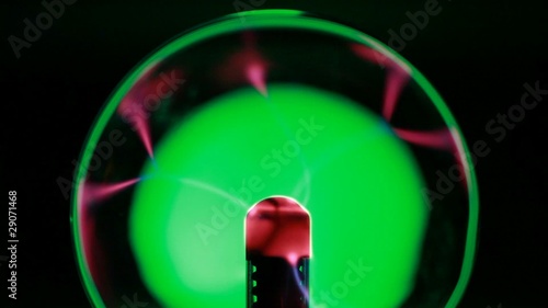 Glass ball, emitting electrical impulses, different colors photo