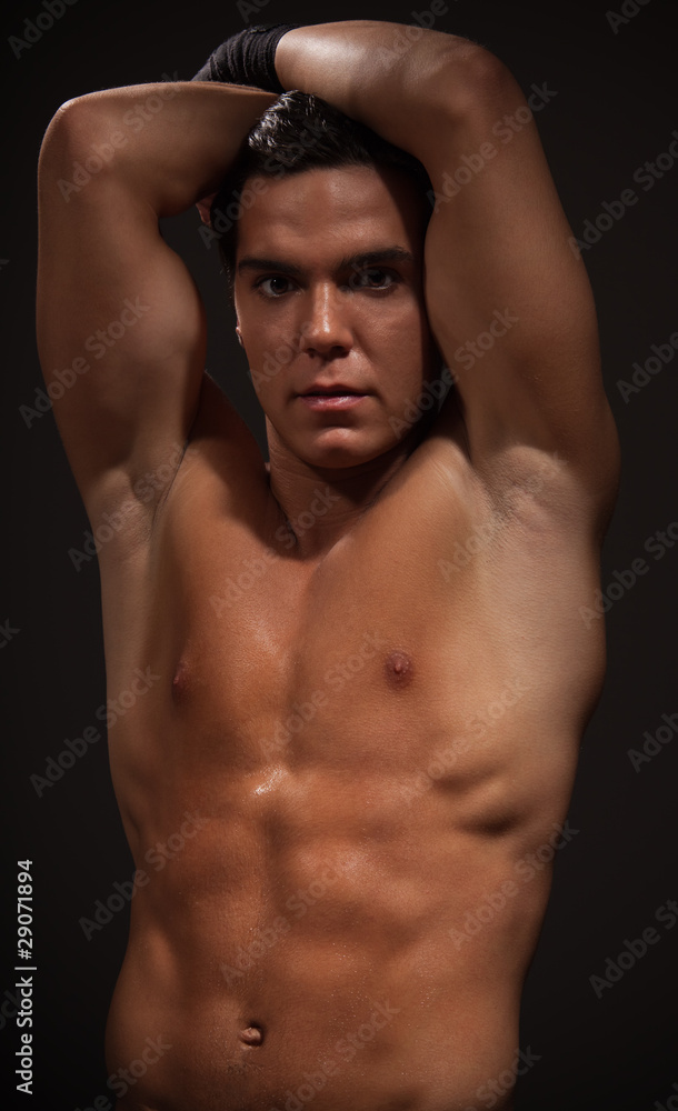 Muscular man with strong arms