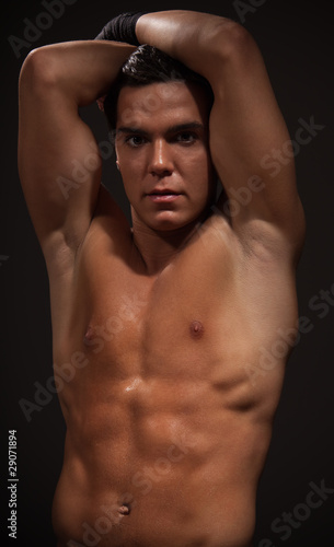 Muscular man with strong arms