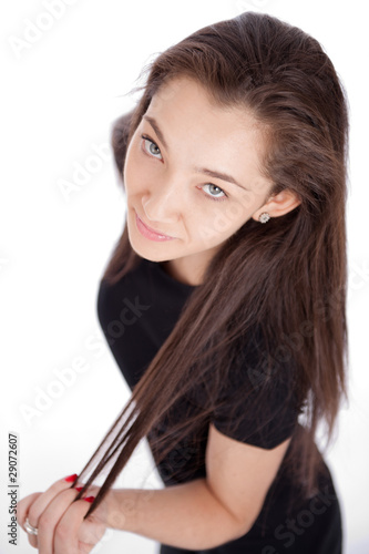Girl playing with her hair