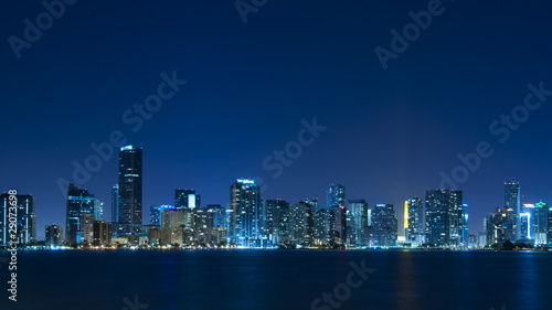Time lapse of Miami skyline at night - slow zoom in