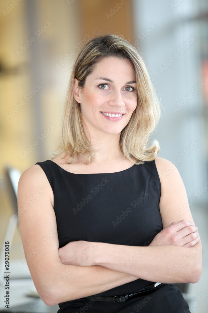 Portrait of beautiful businesswoman with arms crossed