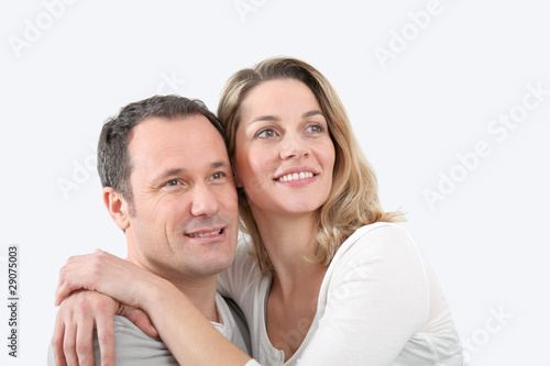 Portrait of happy couple at home © goodluz