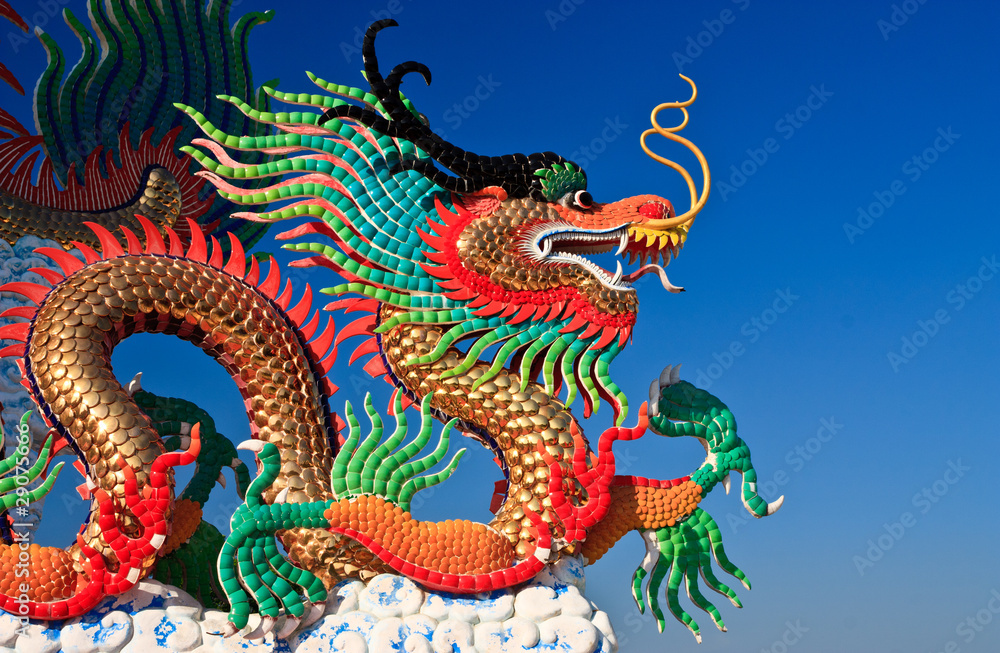 Dragon statue and natural blue sky background Dragon statue and natural blue sky background