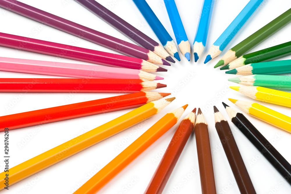 Colorful pencils over white background