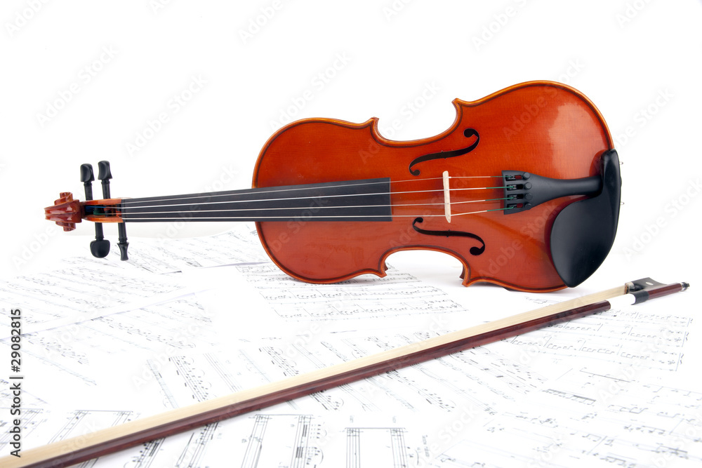Fototapeta premium Violine auf Notenblättern