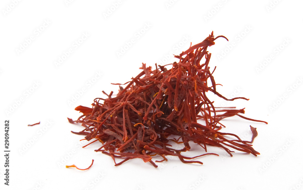 Naklejka premium heap of saffron isolated over white