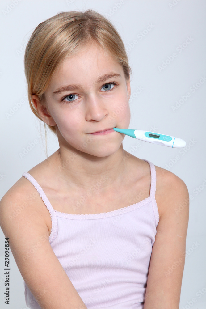 Portrait of little girl with thermometer into mouth Portrait of little girl with thermometer into mouth