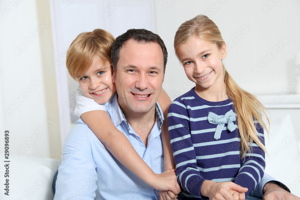 Portrait of father and children at home Portrait of father and children at home