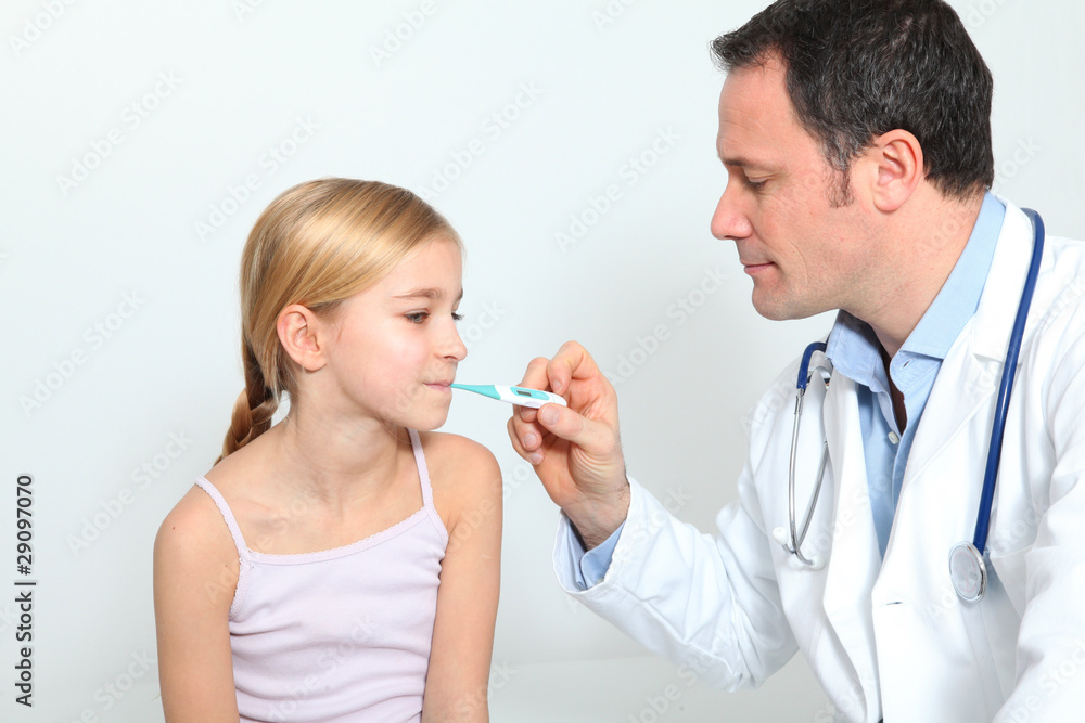 Doctor checking little girl's temperature Doctor checking little girl's temperature