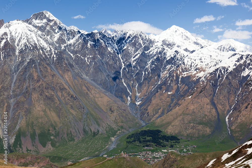 Caucasus Mountains and Stepantsminda village. Georgia.