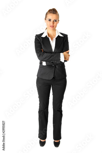 Business woman with crossed arms on chest isolated on white.