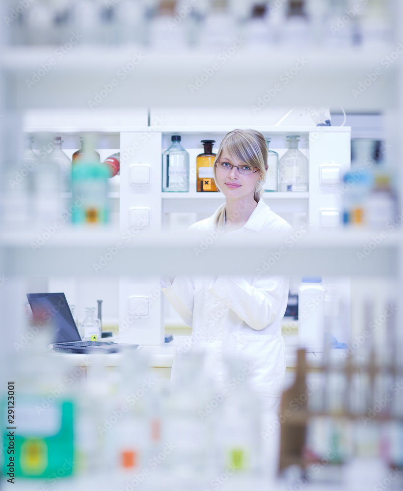 portrait of a female researcher carrying out research in a lab portrait of a female researcher carrying out research in a lab