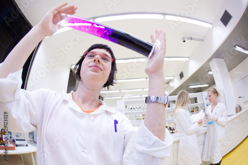 portrait of a female researcher carrying out research in a chemi photo