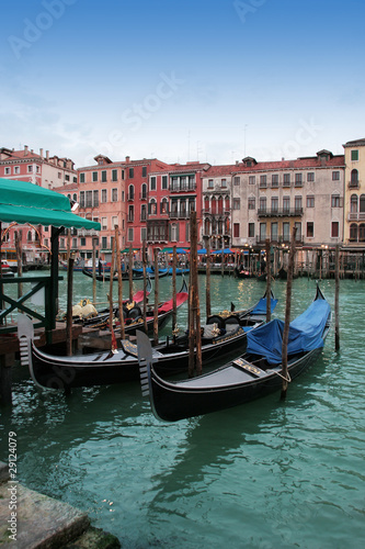 Venice: Traditional gondolas waiting for a romantic ride © icon72
