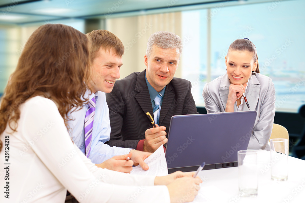 Business meeting - manager discussing work with his Business meeting - manager discussing work with his