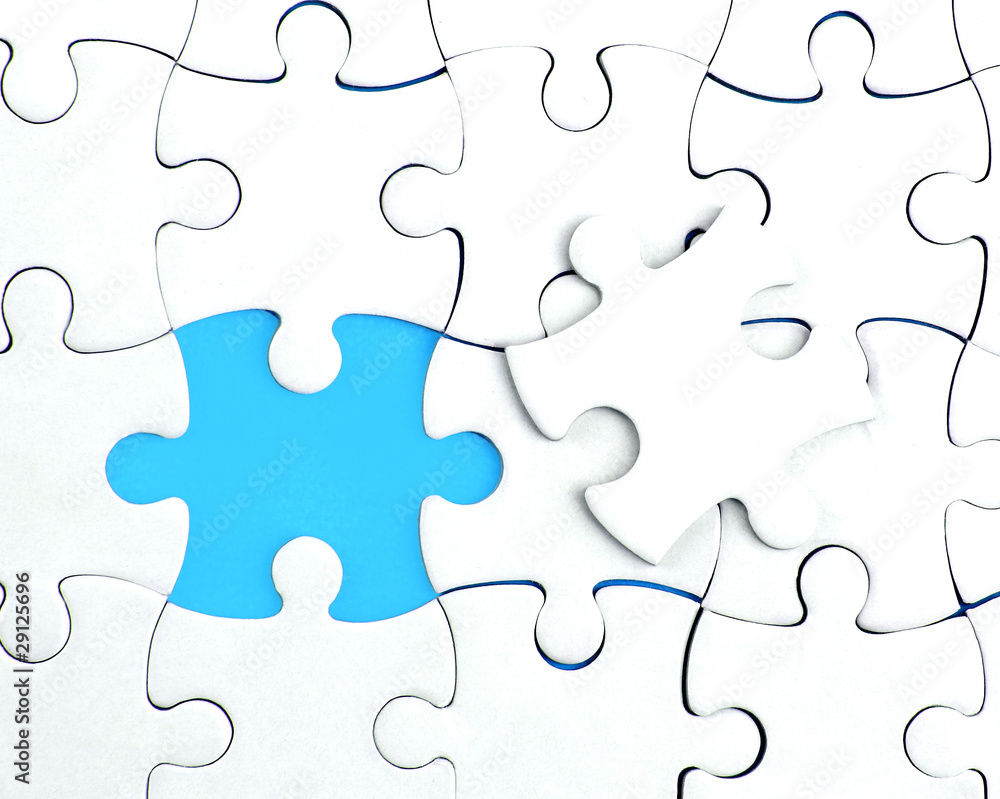abstract puzzle background with one piece missing abstract puzzle background with one piece missing