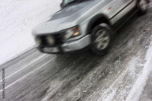 car skidding on an icy road © barneyboogles