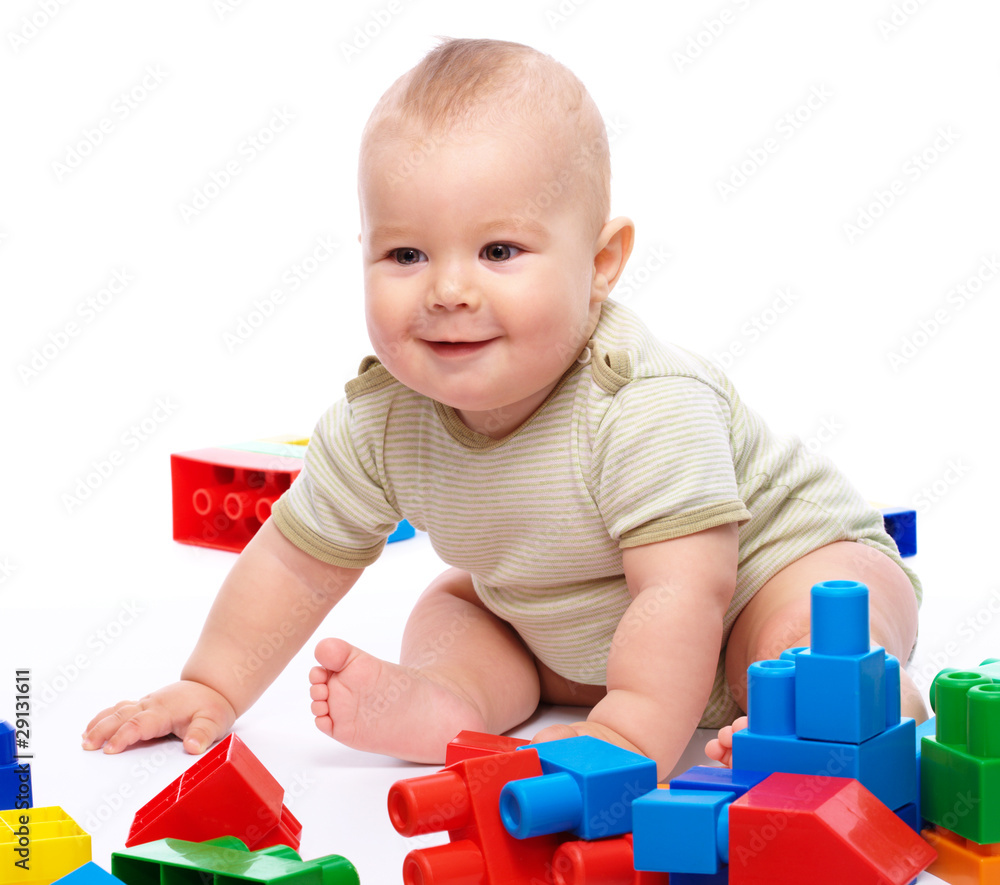 Little boy with building bricks Little boy with building bricks