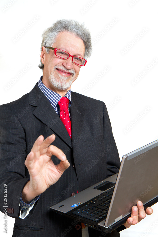 Senior business man with pc Senior business man with pc
