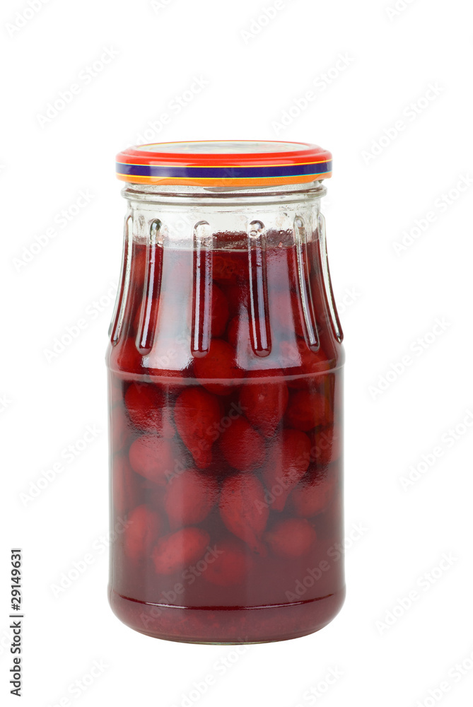 Glass jar with jam maded from cornelian cherries Glass jar with jam maded from cornelian cherries