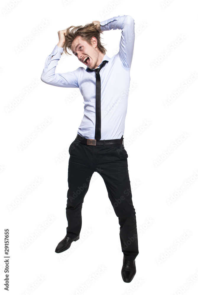 Young man so angry that he wants to pull his hair out Young man so angry that he wants to pull his hair out