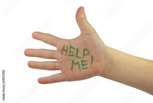 Help me! written on the child's hand
