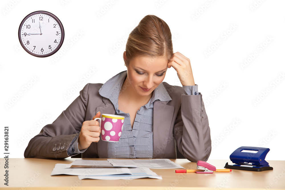 Woman in suit sitting at the desk isolated on white Woman in suit sitting at the desk isolated on white
