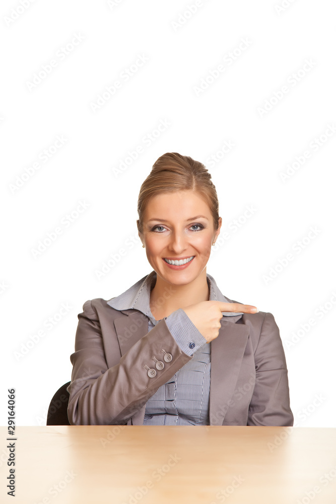 Businesswoman in suit pointing hand isolated on white Businesswoman in suit pointing hand isolated on white