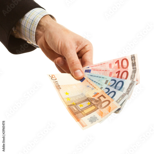 Hand holding euro currency