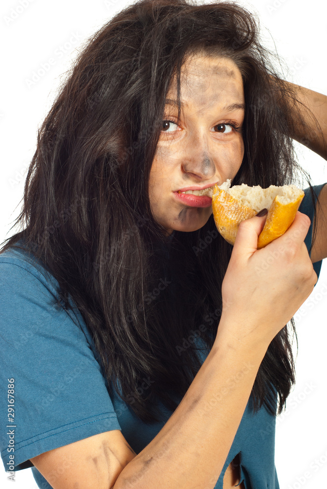 Portrait of beggar girl eat bread