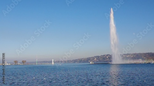 view on Geneva lake, pier and famous Jet d'Eau fountain