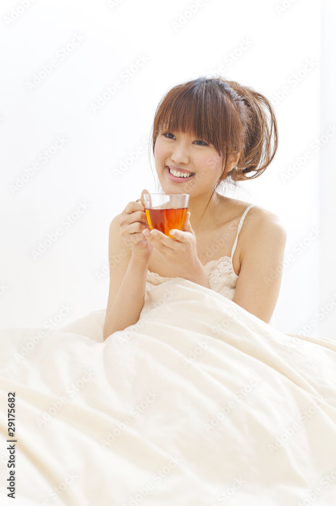 a portrait of beautiful asian woman on the bed a portrait of beautiful asian woman on the bed