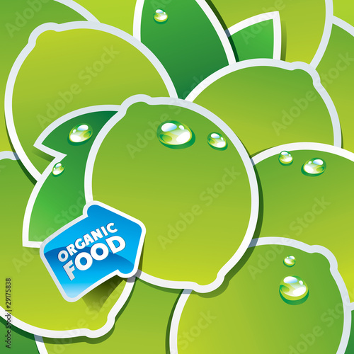 Background from limes and leaves with an arrow by organic food.
