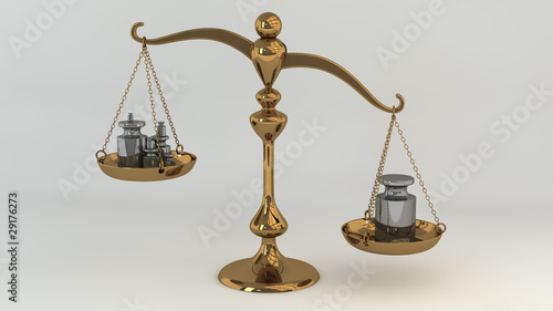 Brass scale with masses on cups