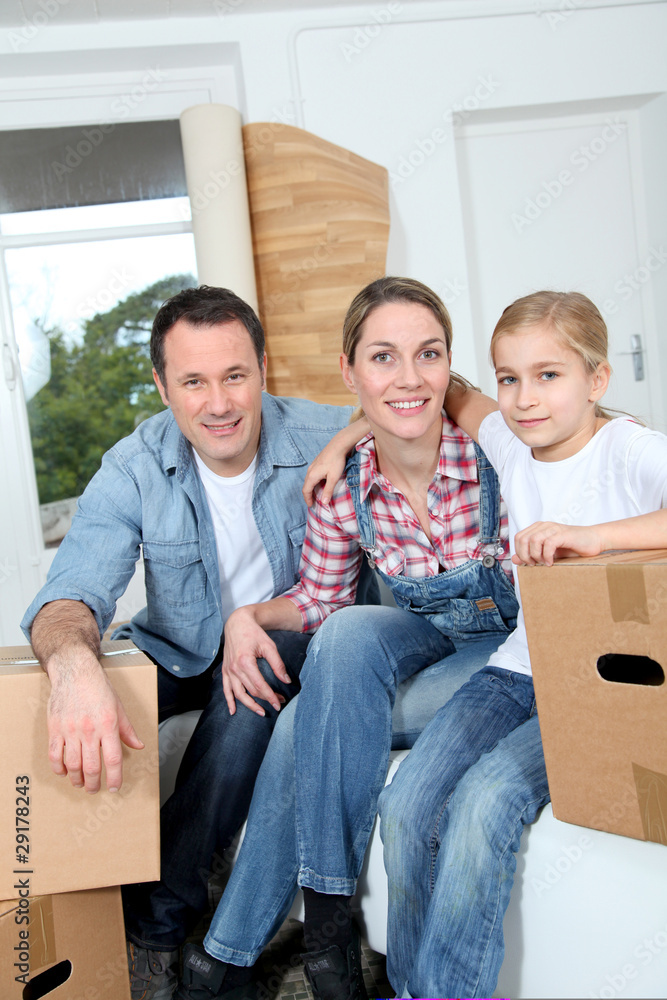 Happy family moving in new house Happy family moving in new house