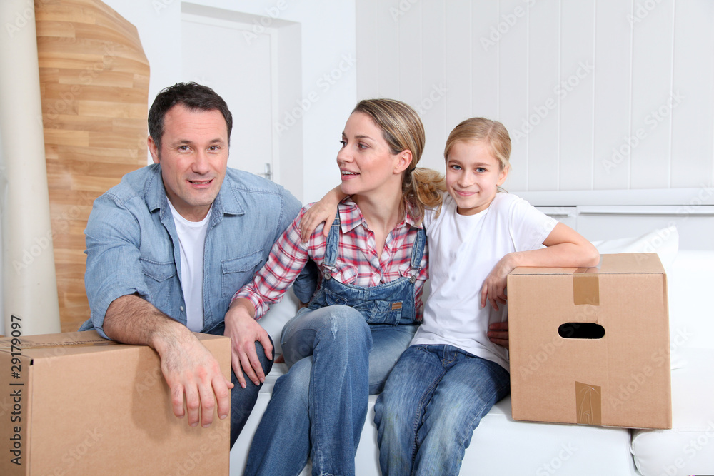 Happy family moving in new house Happy family moving in new house
