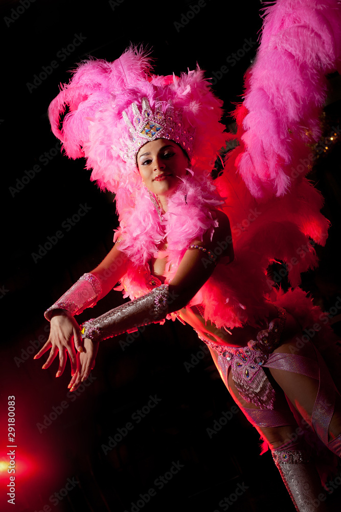 cabaret dancer over dark background
