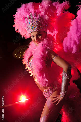 cabaret dancer over dark background