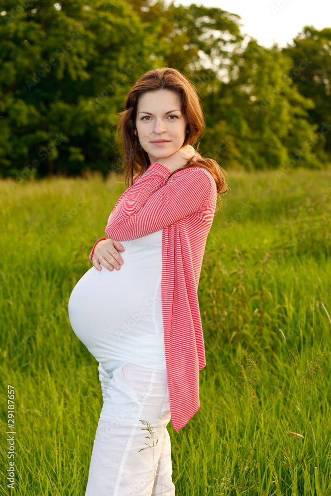 Outdoor portrait of beautiful pregnant woman Outdoor portrait of beautiful pregnant woman
