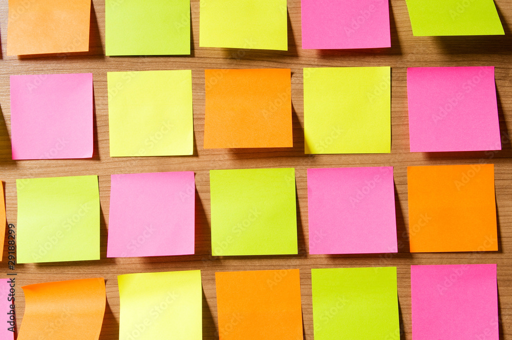 Many reminder notes on the wooden background Many reminder notes on the wooden background