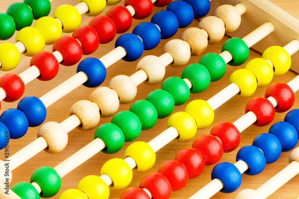 Education concept - Abacus with many colorful beads Education concept - Abacus with many colorful beads