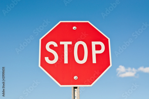 Stop Sign with Blue Sky and Clouds